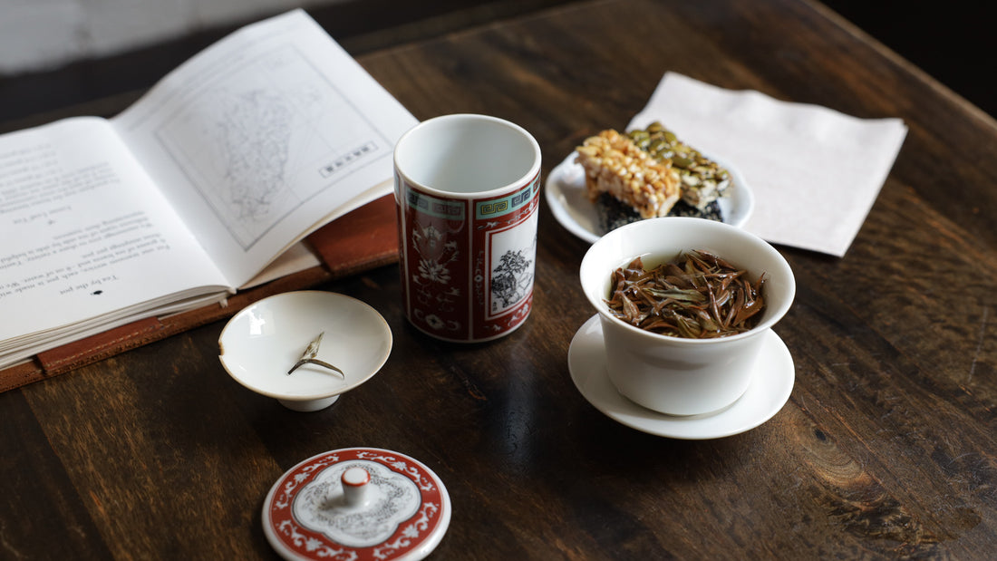 gaiwan with tea leaves and tiny bars
