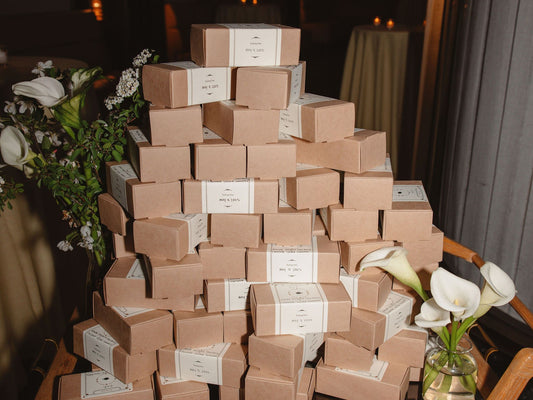 Stack of cookie boxes from Te Company, arranged as wedding favors.