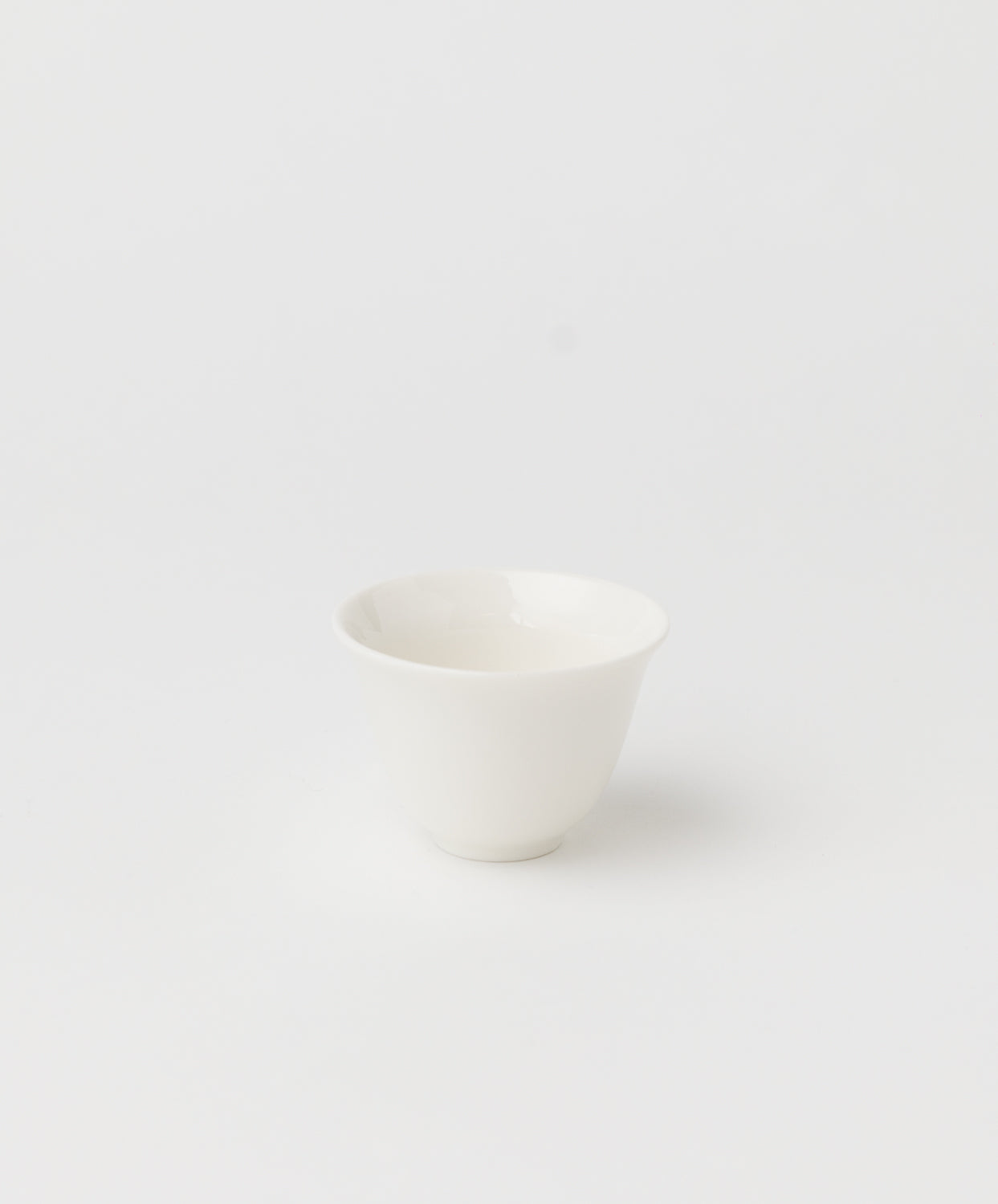 white ceramic tea cup