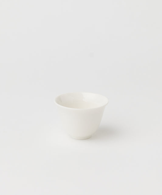 white ceramic tea cup