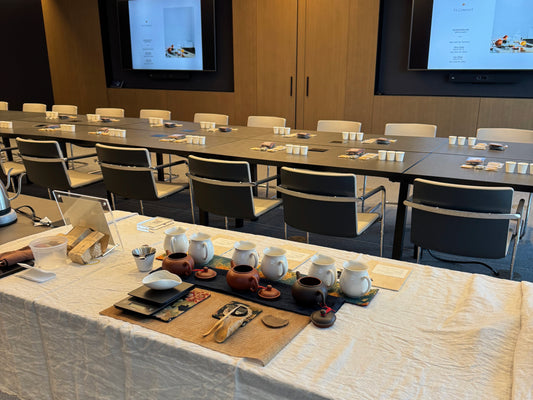 Corporate conference room prepared for professional tea tasting event.
