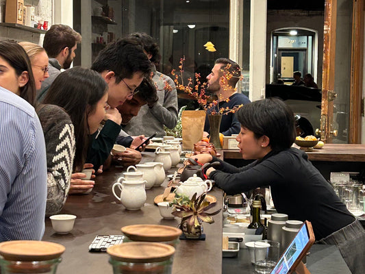 Interactive tea tasting experience at a tea bar.