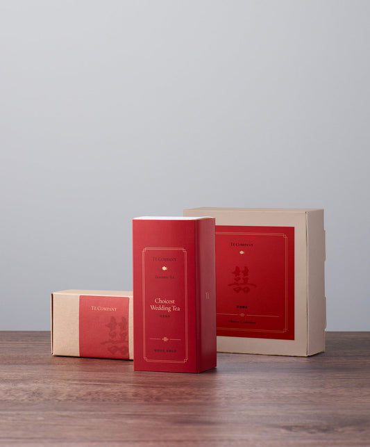 Red ‘Choicest Wedding Tea’ box with other packaging by Té Company